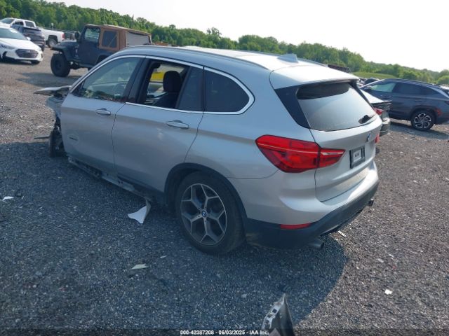 2018 BMW X1 WBXHT3C32J5K23486 Photo 2