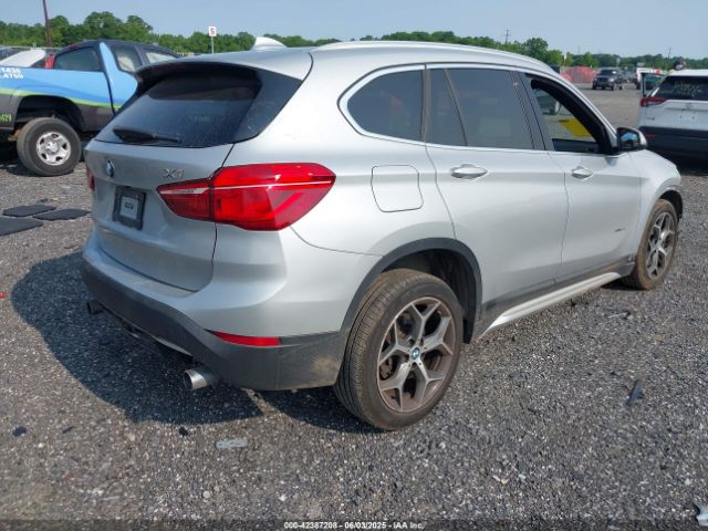 2018 BMW X1 WBXHT3C32J5K23486 Photo 3