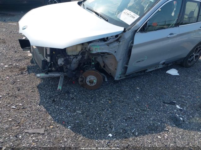 2018 BMW X1 WBXHT3C32J5K23486 Photo 5