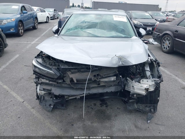 2HGFE1F73NH313912 Honda l15by