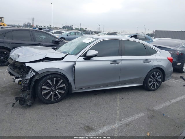 2HGFE1F73NH313912 Honda l15by