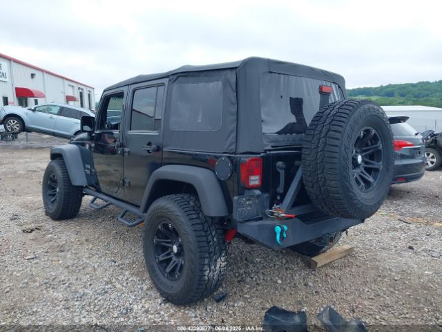 2012 JEEP WRANGLER UNLIMITED 1C4BJWDG2CL119414 Photo 2