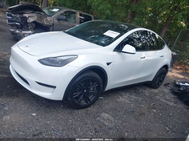 2024 TESLA MODEL Y 7SAYGDEE5RA229542 Photo 1