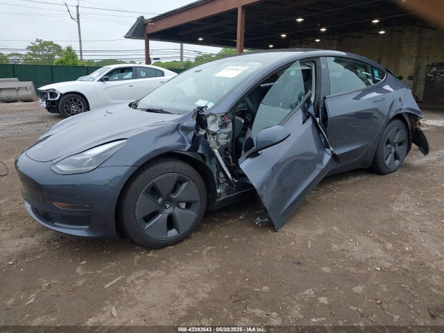 2023 TESLA MODEL 3 5YJ3E1EA9PF673399 Photo 1