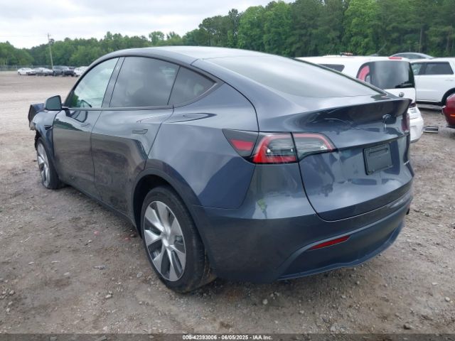2023 TESLA MODEL Y 7SAYGDEE6PF764511 Photo 2