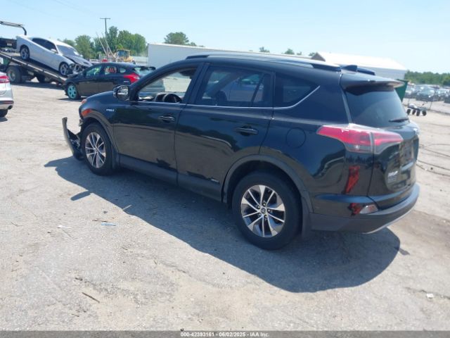 2018 TOYOTA RAV4 HYBRID JTMRJREV4JD199447 Photo 2