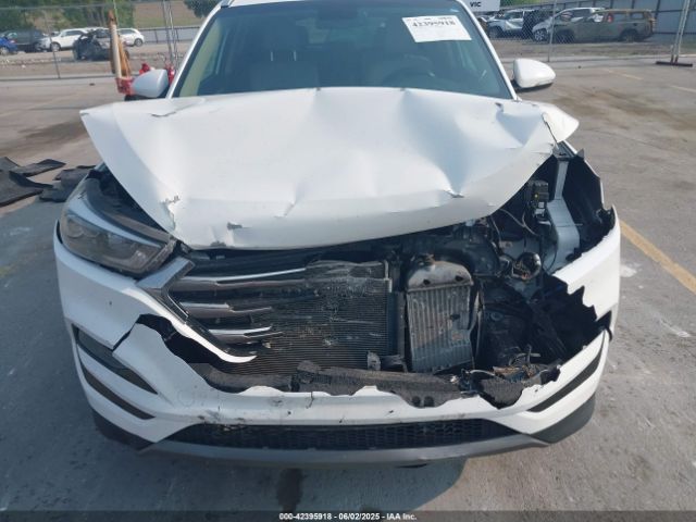 KM8J3CA27GU257250 Hyundai Tucson