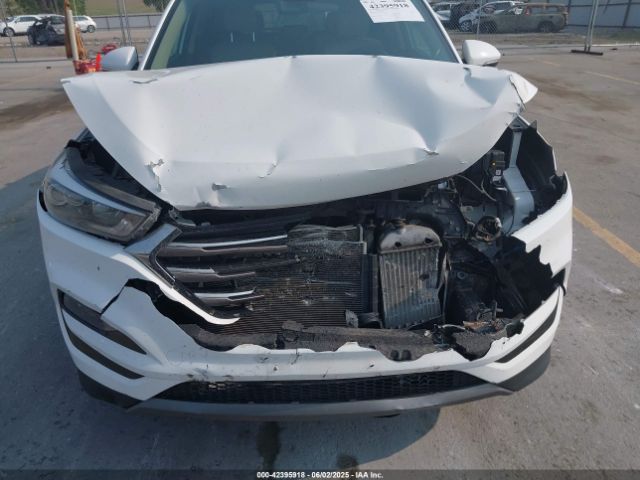 KM8J3CA27GU257250 Hyundai Tucson