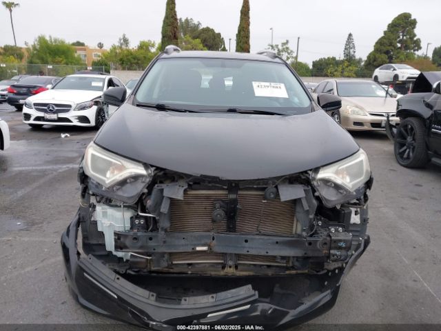 2T3ZFREV3GW251101 Toyota RAV4 LE