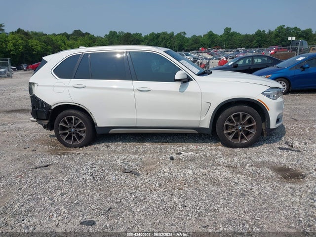 5UXKR2C56H0U20115 BMW X5