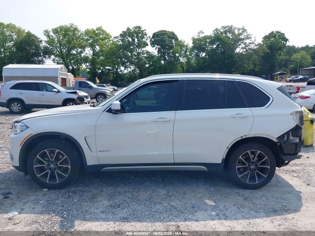 5UXKR2C56H0U20115 BMW X5
