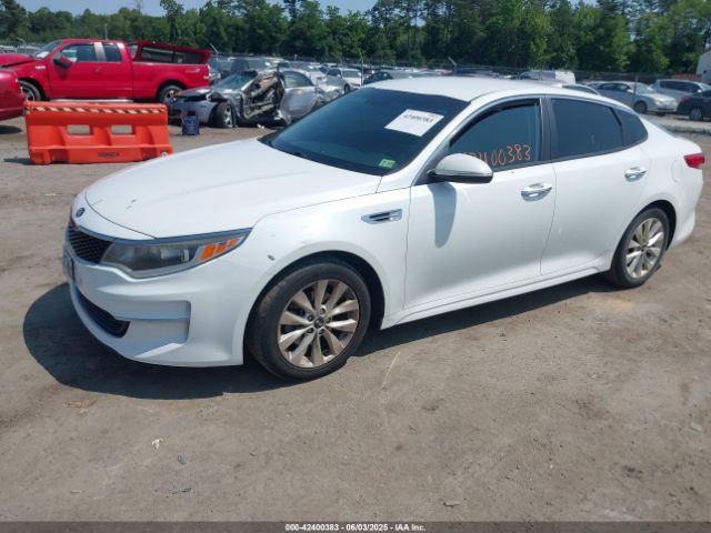 5XXGT4L3XGG009882 KIA Optima Lx
