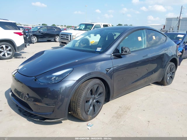 2024 TESLA MODEL Y 7SAYGDEE1RA332683 Photo 1