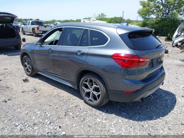 2016 BMW X1 WBXHT3C37GP880815 Photo 2