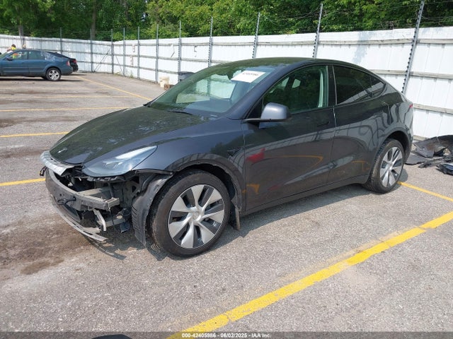 2024 TESLA MODEL Y 7SAYGDED3RF034775 Photo 1