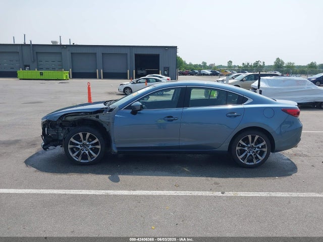 JM1GL1W51H1144726 Mazda py