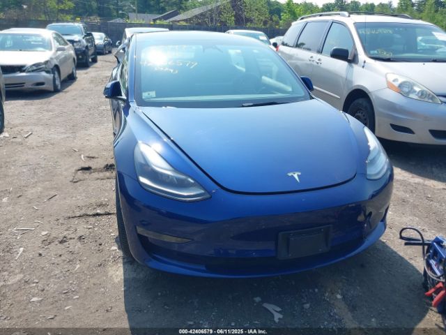 5YJ3E1EA6NF357147 Tesla 2022