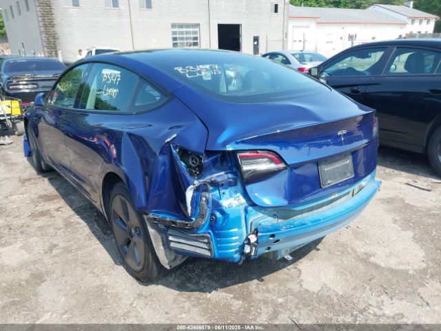 5YJ3E1EA6NF357147 Tesla 2022