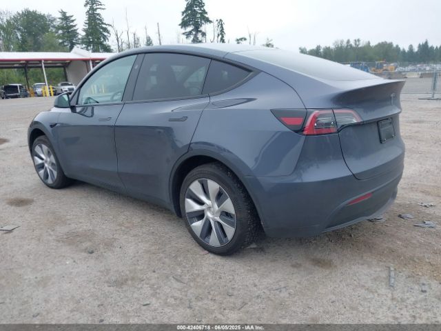 2023 TESLA MODEL Y 7SAYGDED0PF934319 Photo 2