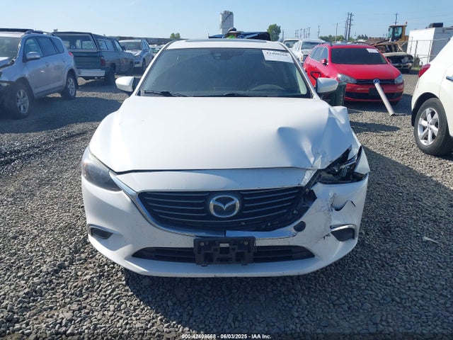 JM1GJ1T52G1435650 Mazda py