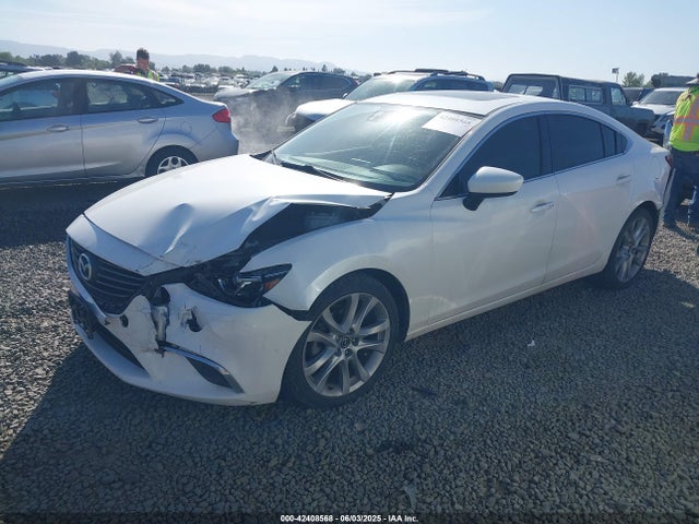 JM1GJ1T52G1435650 Mazda py