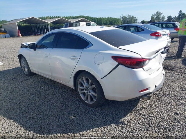 JM1GJ1T52G1435650 Mazda py