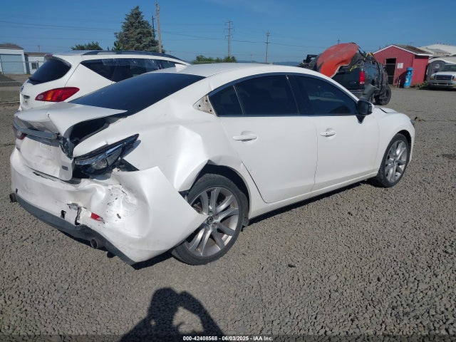 JM1GJ1T52G1435650 Mazda py