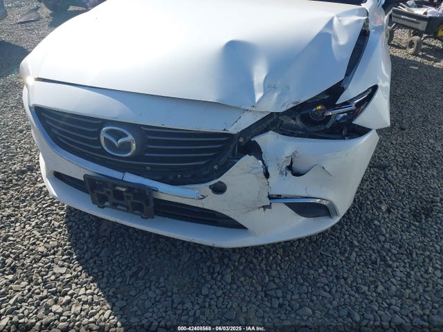 JM1GJ1T52G1435650 Mazda py
