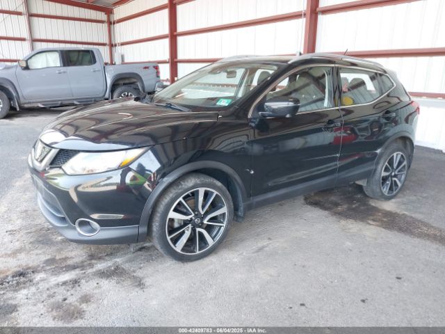 JN1BJ1CR2JW600090 Nissan Rogue Sport Sl