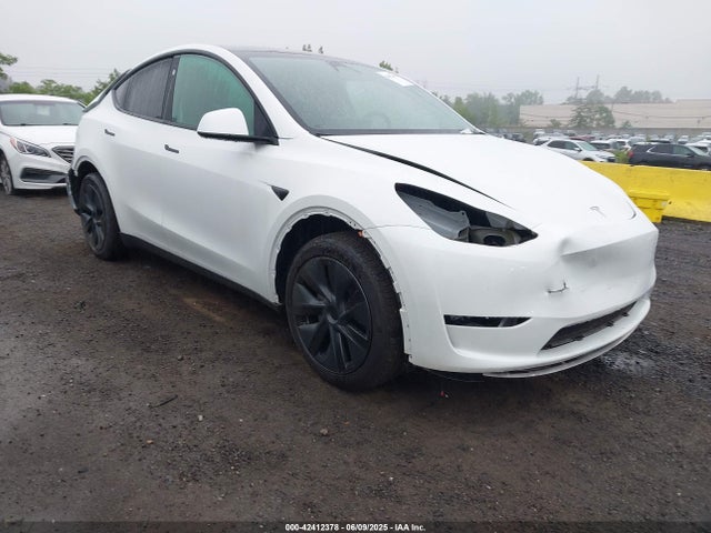 2024 TESLA MODEL Y 7SAYGDEE8RF150210 Photo 0