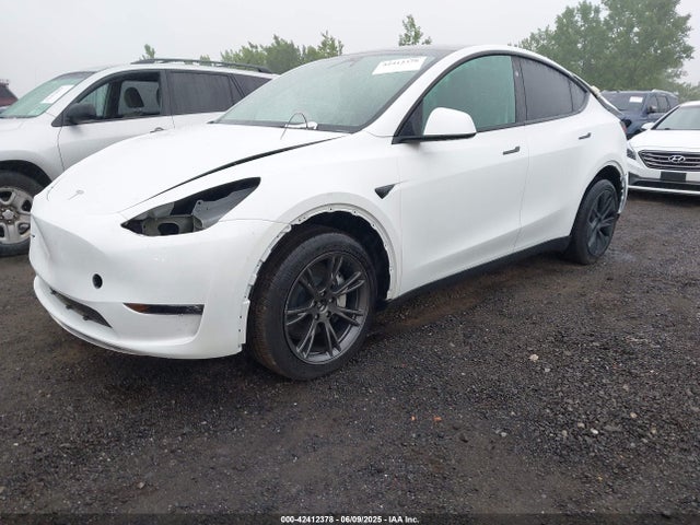 2024 TESLA MODEL Y 7SAYGDEE8RF150210 Photo 1