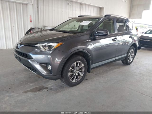 2018 TOYOTA RAV4 HYBRID JTMRJREV0JD252256 Photo 1