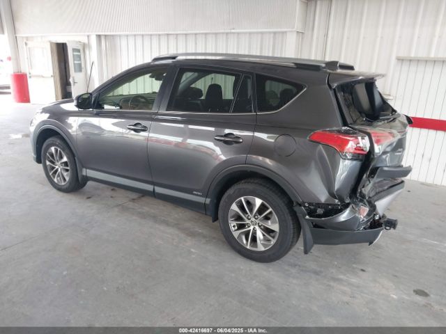 2018 TOYOTA RAV4 HYBRID JTMRJREV0JD252256 Photo 2