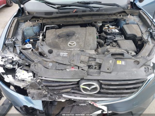 JM3KE2DY6G0609620 Mazda py