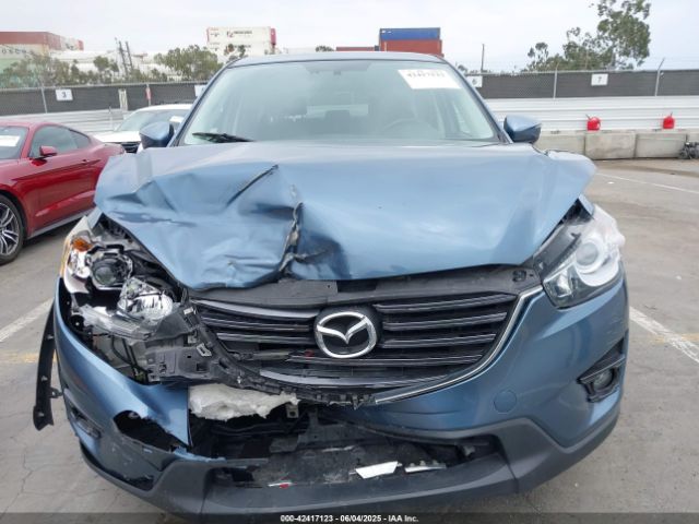 JM3KE2DY6G0609620 Mazda py