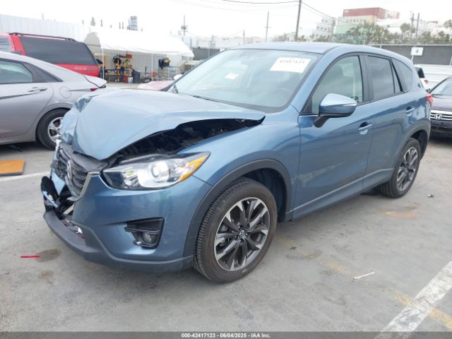 JM3KE2DY6G0609620 Mazda py