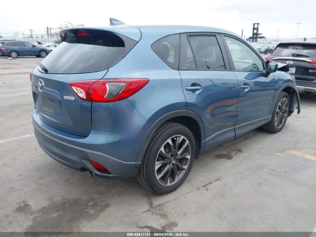 JM3KE2DY6G0609620 Mazda py