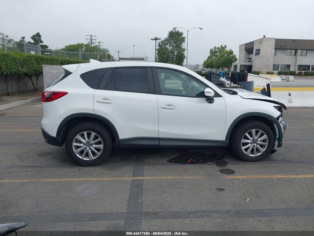 JM3KE2CY5G0764788 Mazda py