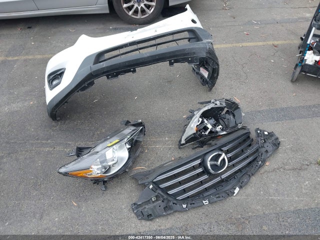 JM3KE2CY5G0764788 Mazda py