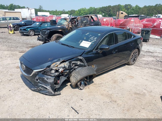 JM1GJ1W50G1425565 Mazda py