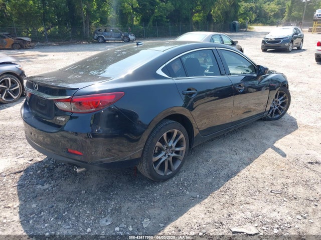JM1GJ1W50G1425565 Mazda py