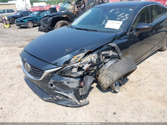 JM1GJ1W50G1425565 Mazda py
