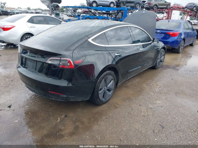5YJ3E1EA3KF297565 Tesla 2019