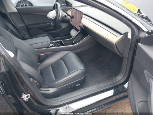 5YJ3E1EA3KF297565 Tesla 2019