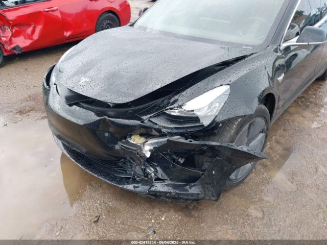 5YJ3E1EA3KF297565 Tesla 2019