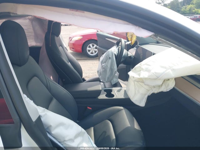 2023 TESLA MODEL Y 7SAYGDEE6PF668863 Photo 4