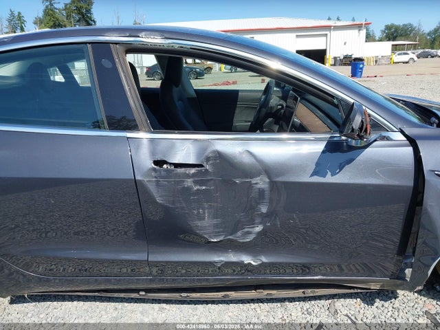 5YJ3E1EA9JF163495 Tesla 2018