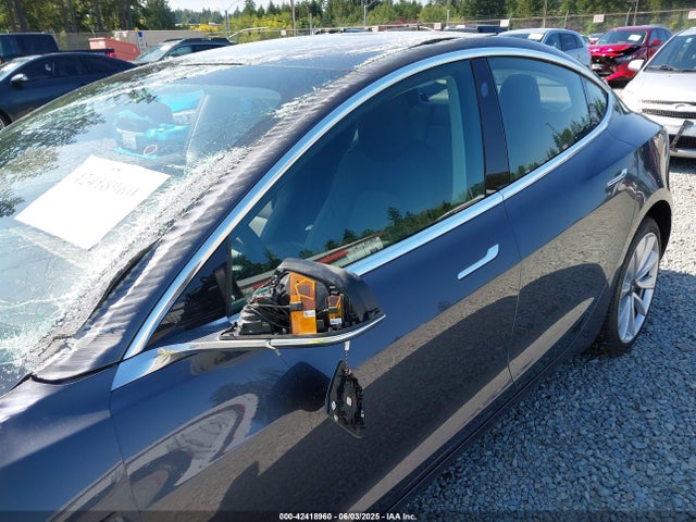 5YJ3E1EA9JF163495 Tesla 2018