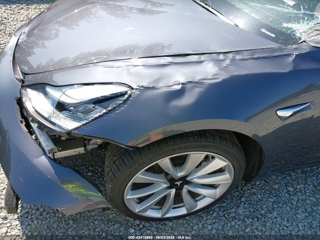 5YJ3E1EA9JF163495 Tesla 2018