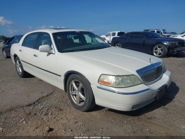 2004 LINCOLN TOWN CAR 1LNHM83WX4Y631136